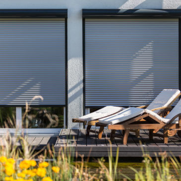 De isolerende en kostenbesparende werking van rolluiken